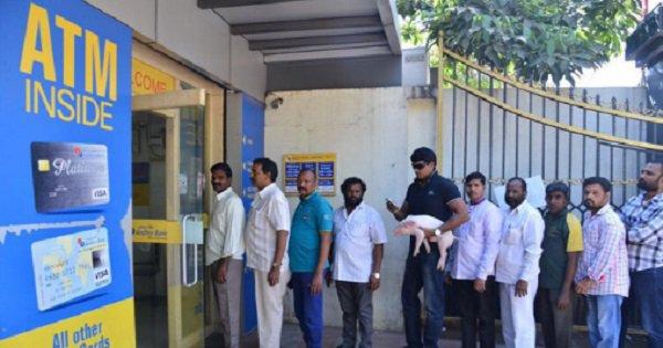 South Indian Actor Ravi Babu Spotted Holding A Piglet In A Bank Queue!