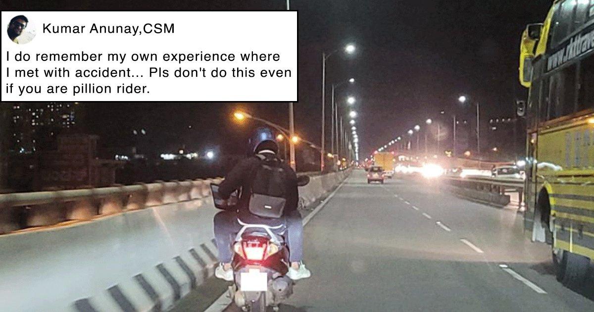 This Pic Of A Man Allegedly Working On His Laptop While Riding Pillion Has People Fuming